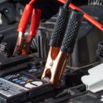 close-up-of-charging-car-with-clamps